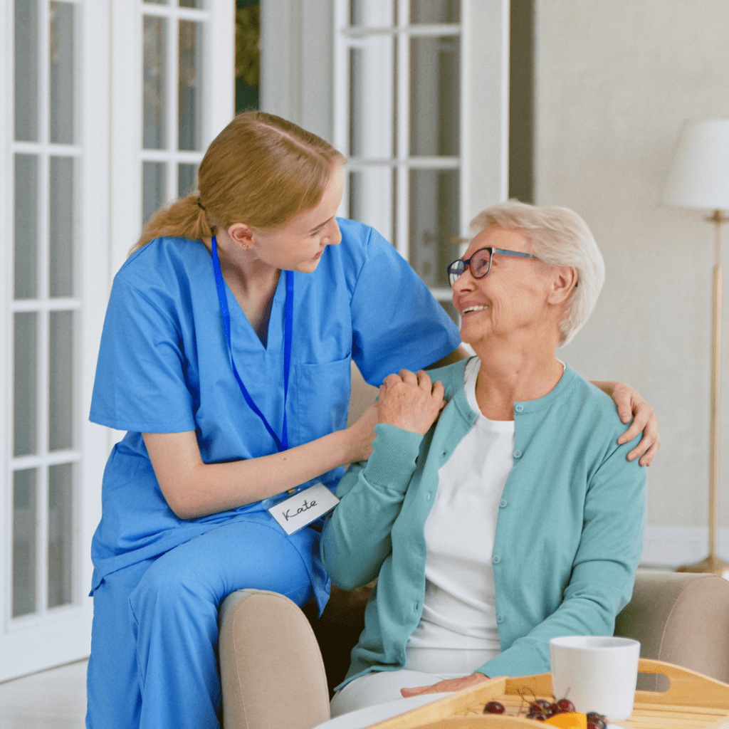 Trusted nurse and patient sharing a moment during in-home wound care in Riverside County